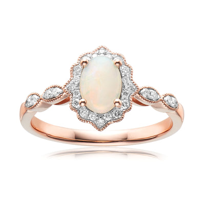 9ct Rose Gold Oval Cut 7x5mm Opal & 0.15 Carat tw of Dimaonds Ring
