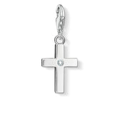 Silver cross pendant with a small gemstone on a white background