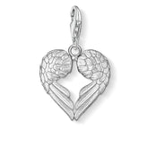 Silver heart-shaped pendant with wings on a white background