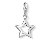 Silver star-shaped pendant on a white background