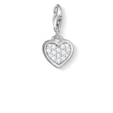 Heart-shaped silver pendant with clear stones on a white background