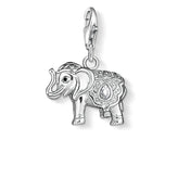 Silver elephant charm with intricate details on a white background