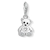 Silver teddy bear charm with heart on a white background
