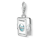 Silver charm shaped like a passport with 'Thomas Sabo' branding on a white background