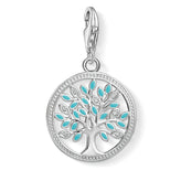 Silver pendant with blue enamel leaves on a white background