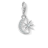 Silver pendant with star and moon design on a white background