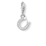 Silver charm shaped like a horseshoe with embedded stones on a white background