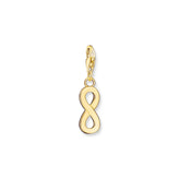 Gold infinity charm on a white background