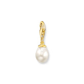 Gold pendant with a white pearl on a white background