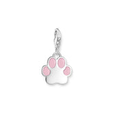 Silver charm with a pink paw print on a white background