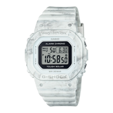 Casio G-Shock digital watch with a white marbled strap on a white background