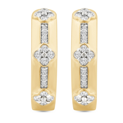  Pair of yellow gold huggie earrings featuring floral shaped diamond clusters and vertical rows of small round diamonds, shown from front  angle.
