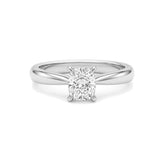 A classic solitaire engagement ring featuring a round brilliant-cut diamond set in a polished four-prong white gold band, shown on a clean white background.