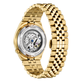 Gold Citizen watch with a detailed mechanical movement on a white background