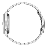 Close-up of a silver watch with a detailed bezel on a white background