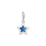 Star-shaped charm with blue glittery center on a white background