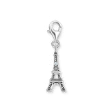 Silver Eiffel Tower charm on a white background