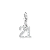 Silver charm with the number '21' on a white background