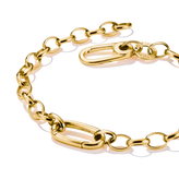 Gold chain bracelet on a white background