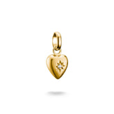 Gold heart-shaped pendant with a Zirconia on a white background
