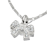 A silver bow-shaped pendant necklace paved with clear cubic zirconia stones, shown on a white background with a silver chain.