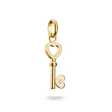 Gold key-shaped pendant with heart details on a white background