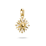 Gold sun-shaped pendant on a white background