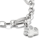 Silver bracelet with a paw-shaped charm on a white background
