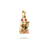 Gold pendant shaped like a cat with red accents on a white background