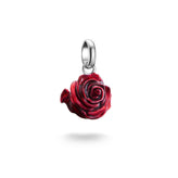 Red rose-shaped pendant on a white background