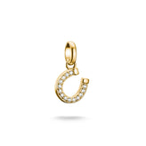 Gold plated pendant shaped like a horseshoe with embedded zirconia stones on a white background