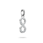 Silver infinity pendant with zirconia  stones on a white background