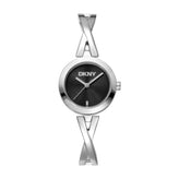 DKNY women's watch featuring a round silver-tone case, a black dial with silver hands and the DKNY logo, and a distinctive silver-tone twisted 'X' link band, shown on a plain white background.