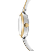 Close-up of a watch with a silver and gold band on a white background