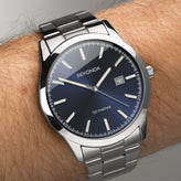 A man wears Sekonda Analogue Watch with Blue Dial and Stainless Steel Bracelet 43mm SK1943