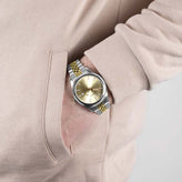 A model wears a Sekonda Analogue Watch with Champagne Dial and Two Tone Bracelet 40mm SK30259