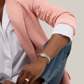 A model wear a Sekonda Ladies Analogue Watch with White Dial and Two Tone Bracelet 20mm SK40125