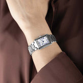 A model in Sekonda Ladies Analogue Watch with White Dial and Silver Tone Bracelet 22mm SK40692