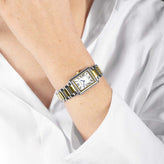 A model wears Sekonda Ladies Analogue Watch with White Dial and Two Tone Bracelet 22mm SK40693