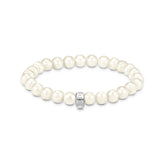 Pearl bracelet with a silver ring on a white background