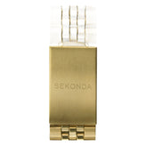 A close-up of a Sekonda watch band clasp, featuring a brushed gold metal band with a clear plastic upper section and the brand name 'SEKONDA' engraved on the face.