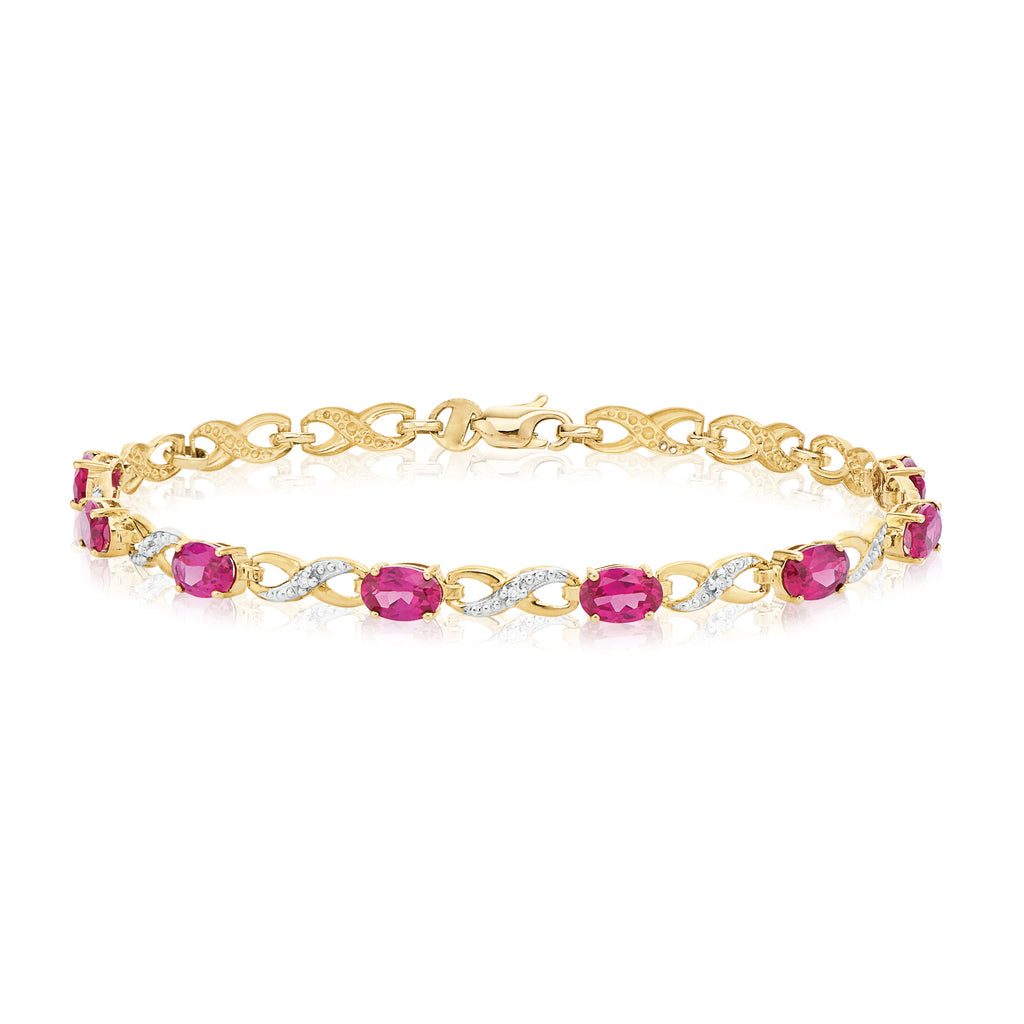 Dabakarov Oval Ruby Bracelet in 14kt White Gold with Diamonds (1/3ct t –  Day's Jewelers