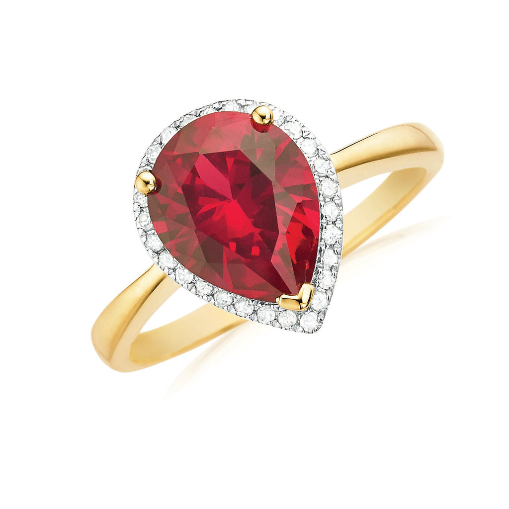 Pear Cut Ruby Engagement Ring in White Gold - Filigree Jewelers